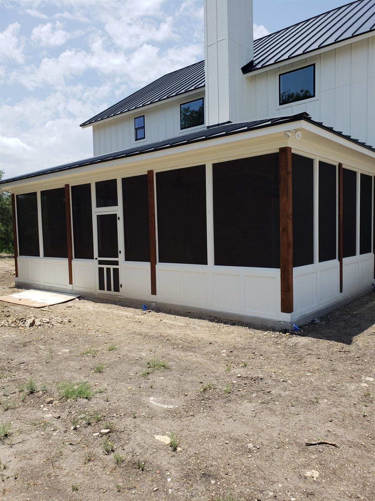 Home exterior with solar screens in Weatherford TX